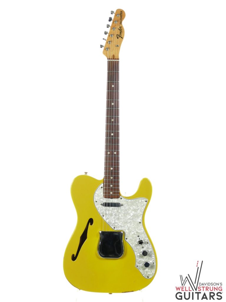 a photo of a thinline in Canary Yellow